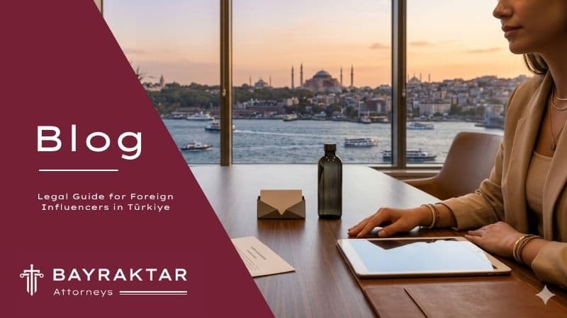 A legal consultation at Bayraktar Attorneys Law Office where an attorney and a foreign influencer review a service agreement on a wooden desk, featuring a fountain pen, document, and tablet against an Istanbul background with Hagia Sophia at sunset.