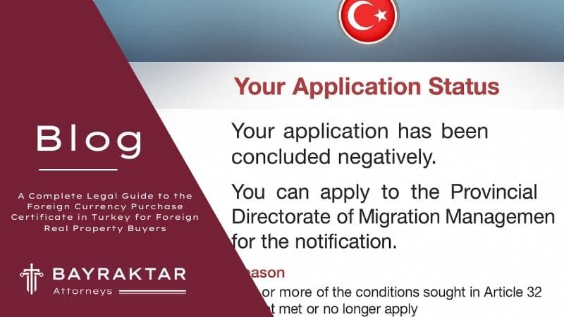 Foreign applicant reviewing a residence permit rejection notice under Article 32 in Türkiye.